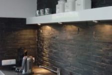 18 a black faux stone kitchen backsplash with addiitonal lights is a cool and stylish idea for a contemporary kitchen