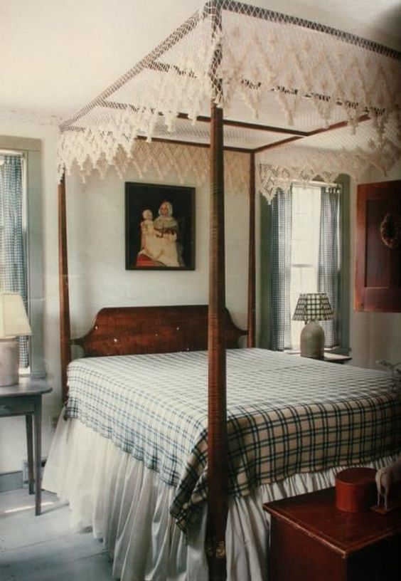 a lace cover gives this vintage bedroom a boho and rustic feel making it even cozier than it is