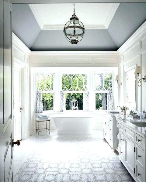 crown molding will fit most of spaces even bathrooms and will give an elegant look and feel to it