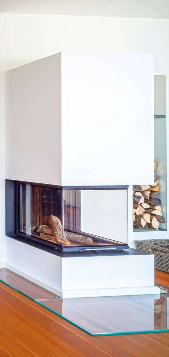 a stylish minimalist glass-encased fireplace is a perfect solution for a contemporary space