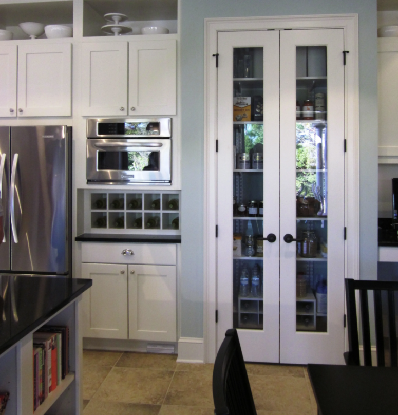 a stylish built-in pantry with matching French doors - these work for most of interiors