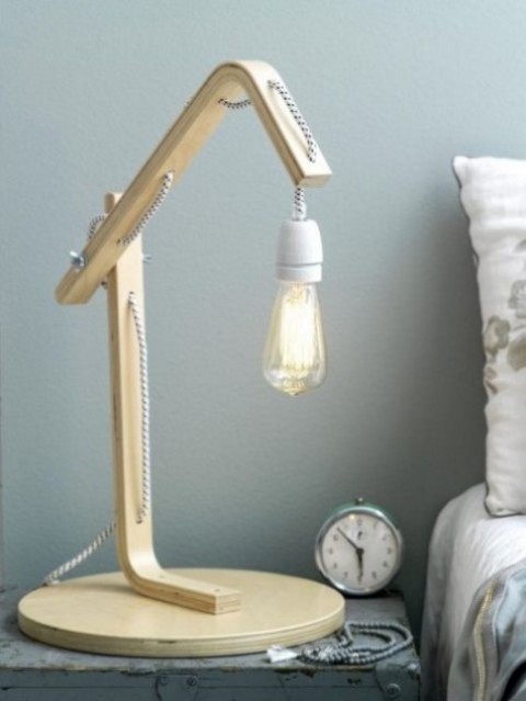 a bedside lamp made of an IKEA Frosta stool for a chic an industrial touch in your bedroom