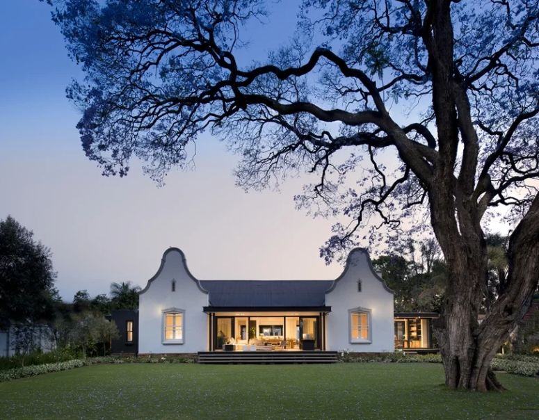 This 1900 farm house was transformed into a contemporary home but its exterior was saved and restored