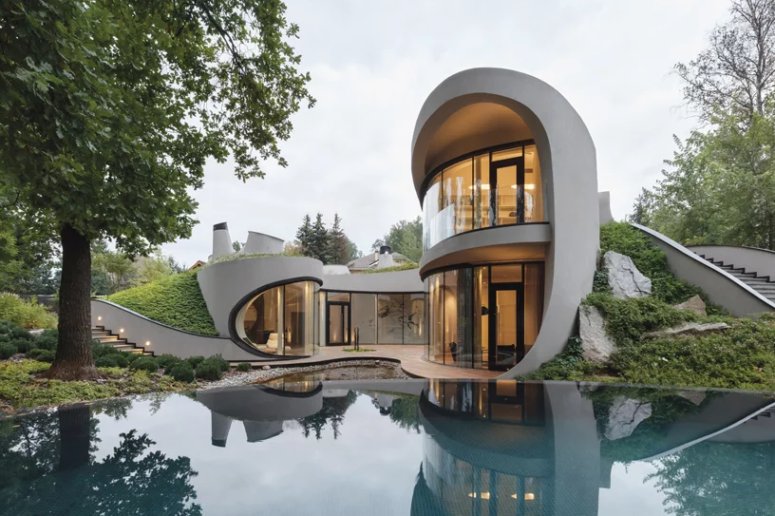 This unique house in Moscow features its own landscape and is fluid and natural within it