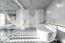 04 The bathroom is hidden behind glass doors and can be made private with curtains, there’s a hammock for relaxation
