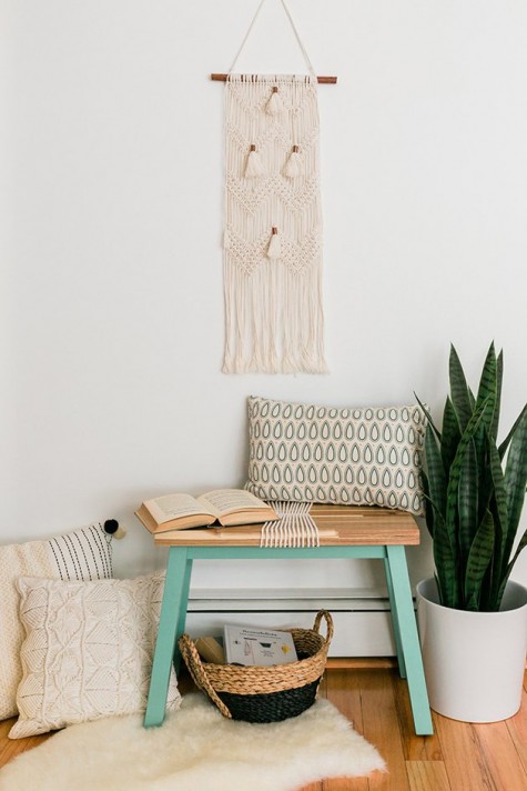 a DIY IKEA Skogsta bench hack with bright paint and rope will fit a boho entryway easily