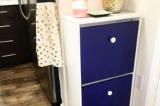 07 a bold IKEA Bissa hack with electric blue fronts and contrasting white knobs for a bold look