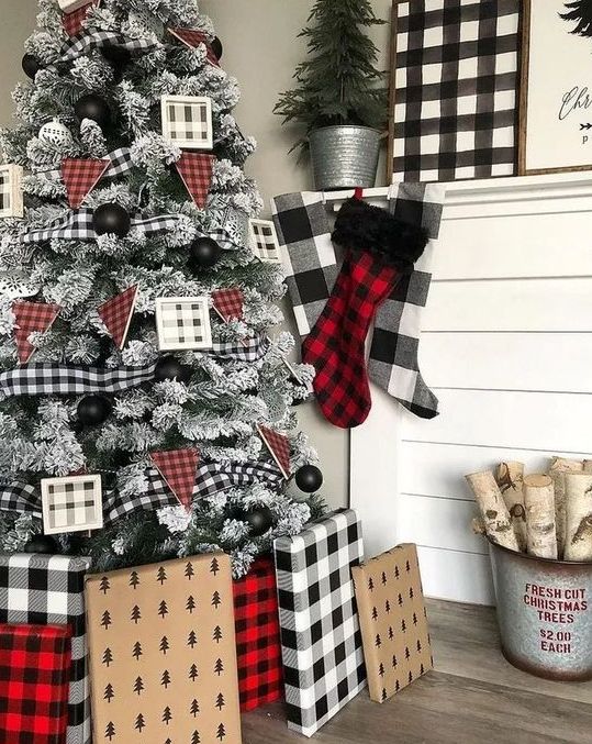 buffalo check ornaments, buntings and ribbons, stockings, an artwork and gifts wrapped into buffalo check and plaid