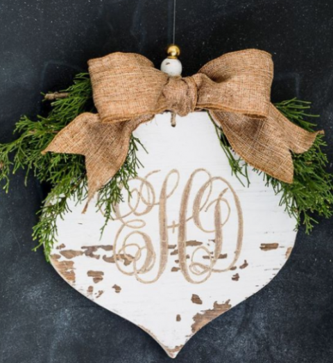 a white plywood Christmas ornament with evergreens, a burlap bow and monograms plus beads is a cool vintage idea