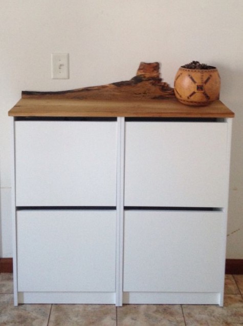An IKEA Bissa hack with a wooden living edge countertop is an edgy idea as live edges are on top right now