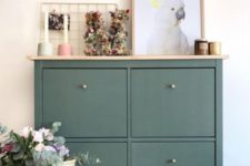 14 a dark green IKEA Hemnes shoe cabinet hack with a wooden countertop is a stylish idea for a modern home