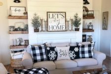 16 buffalo check pillows, a table runner and a blanket are stylish farmhouse-inspired accessories for a cozy feel