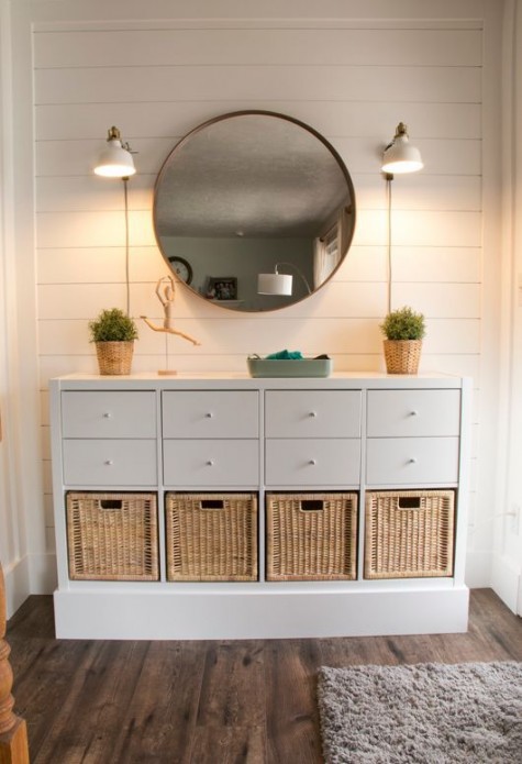 an elegant rustic console table of an IKEA Kallax unit and some basket drawers will rpovide you with a lot of storage space