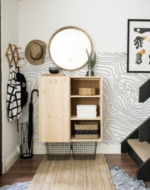 an IKEA Ivar hack into a comfy floating entryway storage piece plus wire baskets is super stylish and will fit many hallways