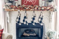 20 buffalo check stockins and some faux Christmas trees to make your space ultimately farmhouse-like