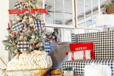 22 a buffalo check loveseat, a Christmas tree with buffalo check ornaments and plaid and buffalo check ribbons