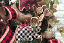 23 plaid and burlap bear ornaments with plaid bows and evergreens plus lots of plaid and burlap ribbons around