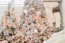 26 two cute snowy Christmas trees with lights, pastel and metallic ornaments and some stripes for a glam touch