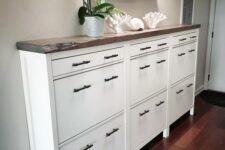 IKEA Hemnes shoe cabinets with black handles, legs and stained countertops for a farmhouse space