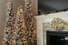 a farmhouse Christmas tree cluter with only lights looks very natural and very eye-catching