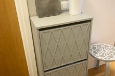 a grey IKEA Bissa hack with geometric panels and paint is a cool and lovely idea for a modern or Scandinavian space