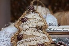 a vintage-inspired burlap Christmas tree ornament with lace, beads and little hearts