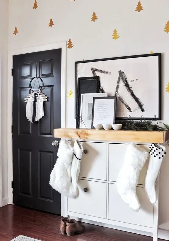 Add a mantel of light colored wood to your IKEA Hemnes shoe cabinet to make it bolder