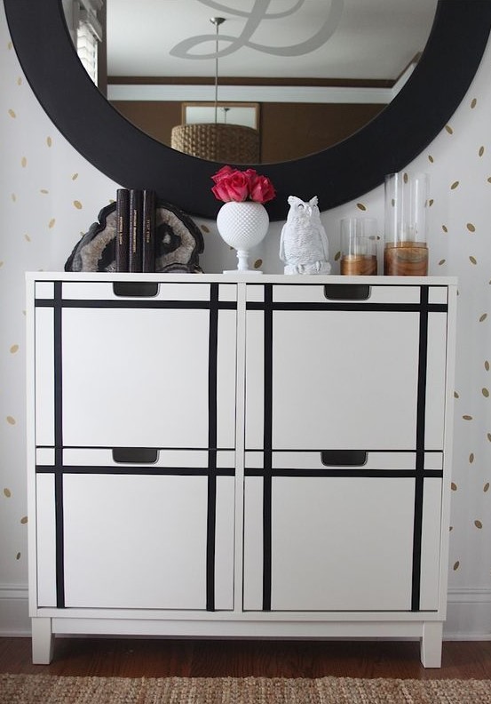 an IKEA Stall cabinet hacked with black stickers to form a pattern is a chic and bold modern idea to try