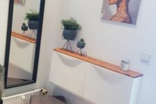 an IKEA Trones piece attached to the wall and covered with a new stained countertop is a lovely solution for a small entryway