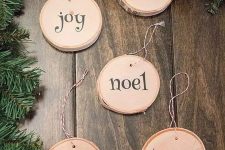 cute printed wood slice ornaments with cute letters are easy to DIY and look neutral