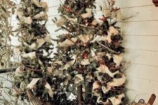 multiple Christmas trees with ribbons, beads, branches and pinecones are amazing for holiday decor