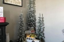 multiple small Christmas trees with some vintage toys are great to style a vintage space or a kids’ room for holidays