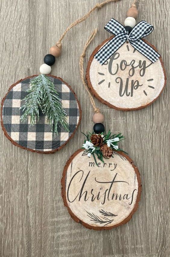 tree slice Christmas ornaments with evergreens, plaid and calligrapy and wooden beads are beautiful and cozy