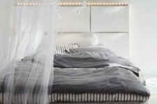 use IKEA Trones to create a comfy headboard with storage and lights, ideal for a contemporary space