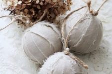 wrap your Christmas ball ornaments with white burlap, twine, pearls for a super chic rustic look
