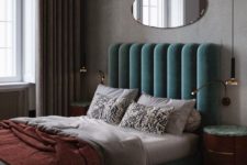 09 a voluminous and luxurious green velvet headboard makes a statement and adds color to the space