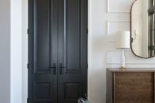 11 graphite grey doors look super elegant and super chic, they add interest to this neutral farmhouse space