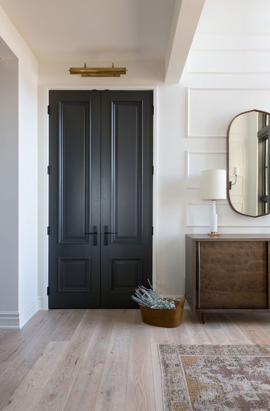 graphite grey doors look super elegant and super chic, they add interest to this neutral farmhouse space