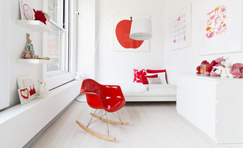 This is a kid's bedroom done in white and red, it's bright and fun