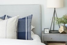 13 a cool striped grey and white upholstered headboard is a nice fit for many bedrooms including this rustic one