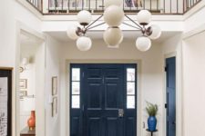 13 a navy door stands out in a neutral space is a cool idea to make a statement with the trendiest color of the year