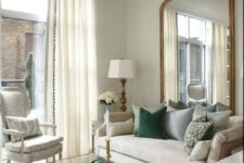15 light-colored floor-length curtains match the living room and make it look higher and larger