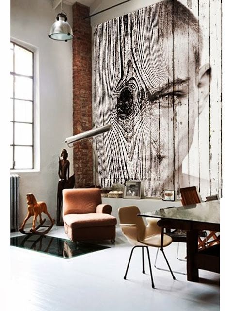a unique wall art on wood that takes the whole wall is a bold statement