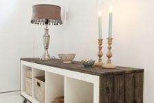 18 an IKEA Expedit shelf covered with weathered wood and put on casters looks wow
