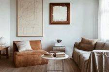 18 an airy and welcoming earthy tone interior in ocher, rust, neutrals and light-colored wood