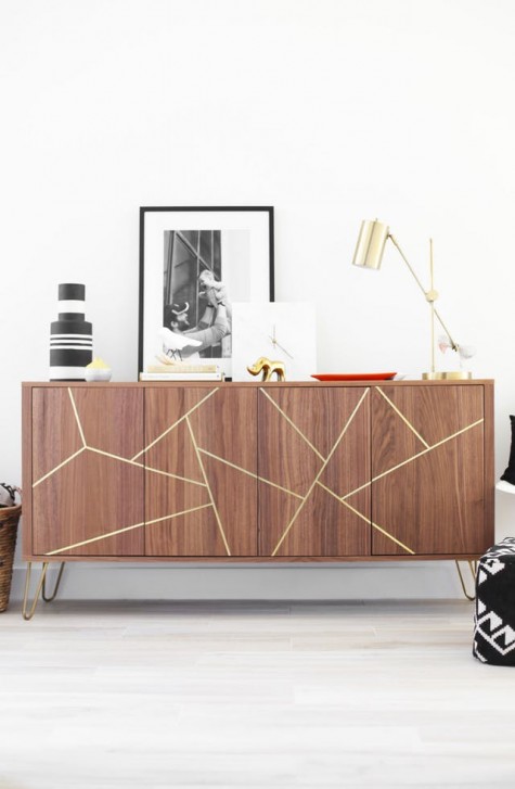 a Stockholm sideboard with gold hairpin legs and a geometric design with gold foil tape