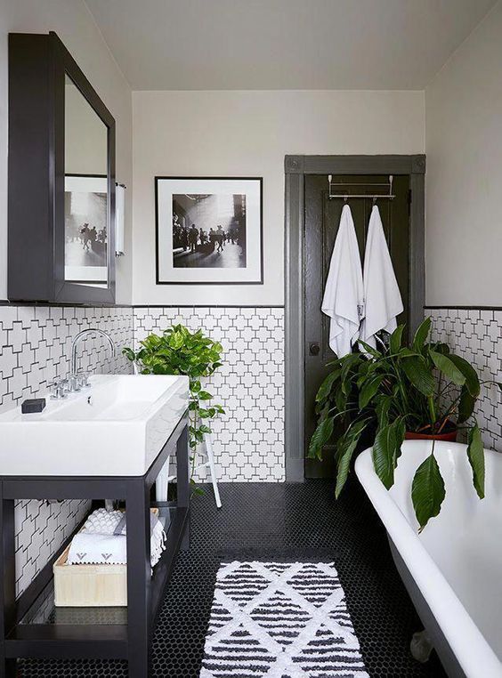 partially tiled walls with black grout that accents the tiles a lot and makes them cooler and bolder