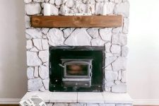 a lovely whitewashed fireplace