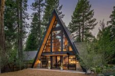 01 This a-frame cabin inspires living in the wild, its roof extends to the ground and it’s unique