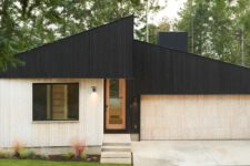 01 This minimalist home in Washington is covered with two tone wood to make its look contrasting and outstanding from the traditional neighborhood